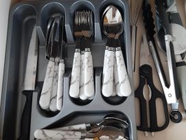 A kitchen cutlery tray with utensils at Taid's Retreat Silversands Cove beach lossiemouth