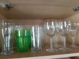 A collection of glassware including tumblers and wine glasses at Taid's Retreat Silversands Cove beach lossiemouth