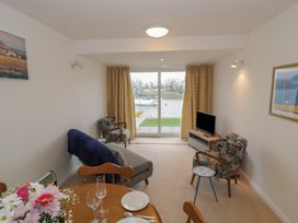 A living room with a view of the water at 10 Oakley Wharf Porthmadog