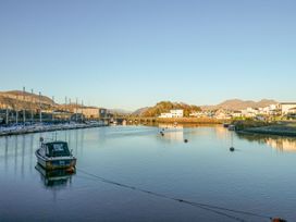 A marina with boats on the water at 10 Oakley Wharf Porthmadog