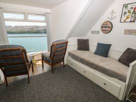A snug with seating and a view at Seaside Steps in Goodwick