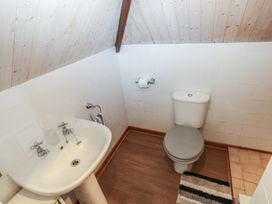 A bathroom with a sink and toilet at Seaside Steps Goodwick