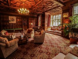 A living room with a pool table and a chess table at Rochester Apartment in Orton