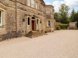 An entrance with steps and seating area at Rochester Apartment in Orton