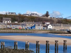 A view of houses along a river at B2 in Lossiemouth