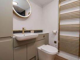A bathroom with a sink and toilet at Little Holm Garth