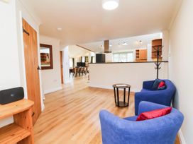 A living room with a sofa and table at The Station House in Blackmoor Gate near Parracombe