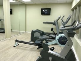 A gym with exercise equipment at Hoburne Blue Anchor - Holiday Accommodation 307 Minehead