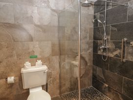 A bathroom with a shower and toilet at Brettargh Holt Mansion near Levens