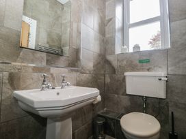 A bathroom with a sink and toilet at Brettargh Holt Mansion near Levens