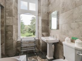 A bathroom with a sink and toilet at Brettargh Holt Mansion near Levens