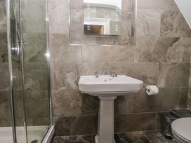 A bathroom with a sink and shower at Brettargh Holt Mansion near Levens