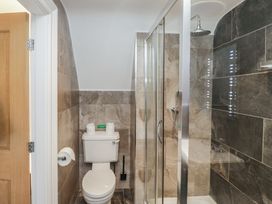 A bathroom with a shower and toilet at Brettargh Holt Mansion near Levens