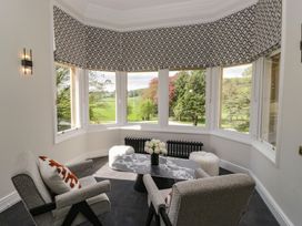 A snug with a table and chairs at Brettargh Holt Mansion near Levens