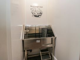 A dog wash area with tub and steps at Brettargh Holt Mansion near Levens