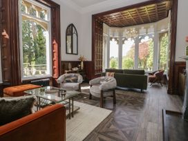 A living room with a coffee table and sofas at Brettargh Holt Mansion 32 near Levens