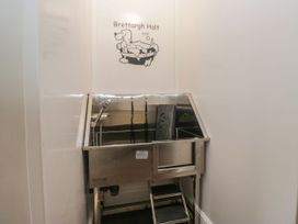 A dog wash station with steps at Brettargh Holt Mansion near Levens