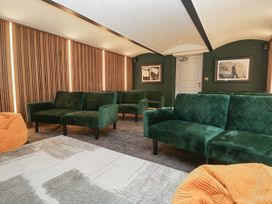A snug with sofas and a bean bag at Brettargh Holt Mansion 32 near Levens