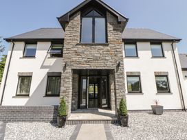 A house entrance with stone facade and windows at Brynseion Uchaf near Aberystwyth