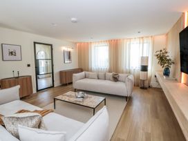 A living room with a coffee table and sofa at Brynseion Uchaf near Aberystwyth