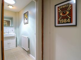A bathroom with a sink and mirror at The Annexe @ Shotley Cottage in Shotley Gate