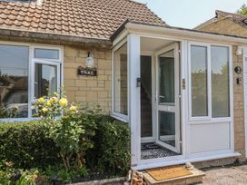 An entrance with a door and steps at Tane in Winterborne Stickland