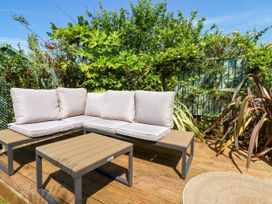 Outdoor seating area with a sofa set and coffee table at 18 Tregea Terrace Portreath