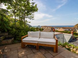 A seating area with a view of the ocean at 18 Tregea Terrace Portreath