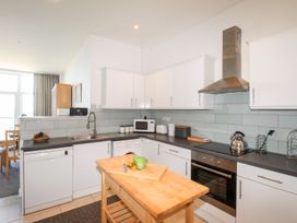 A kitchen with appliances and a countertop at Portland View in Portland Bill