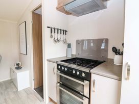 A kitchen with a stove and oven at 18 Eden Heights St Andrews