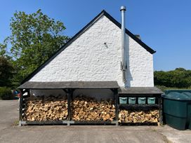 Wood storage and bins at Swallow Cottage near Cowbridge