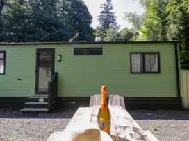 A mobile home with champagne and glasses at 51 Calgarth Park, Troutbeck