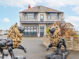 A house with lion statues at the entrance at 15 Cherry Tree walk Rhyl