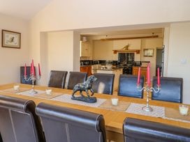 A dining room with a table and seating at Tuft House in Hovingham