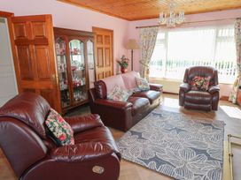 A living room with a sofa and armchairs at Marie's Country Home in Ardee, County Louth