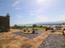 An outdoor area with a patio and view at Apartment 1, Bryn Mel Manor in Menai Bridge