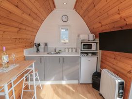 A kitchen with a countertop and kitchenette at Cosy Cocoon in Malton