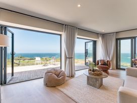 A living room with a view of the sea at tbc St. Ives