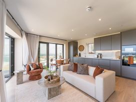 A living room with a sofa and coffee table at tbc in St. Ives