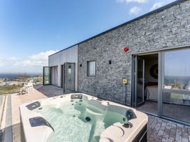 An outdoor area with a hot tub at tbc in St. Ives