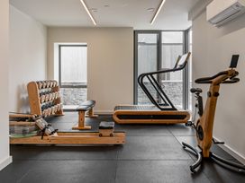A gym with various fitness equipment at Hidden 17- Lookout Terrace Hot Tub St Ives