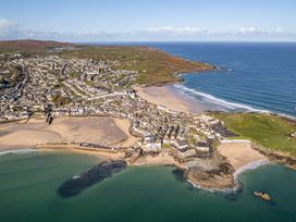An aerial view of a coastal town by the beach at Hidden 20- Gallery Hot Tub in St Ives