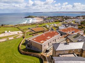 A seaside view with houses and beach at tbc in St. Ives
