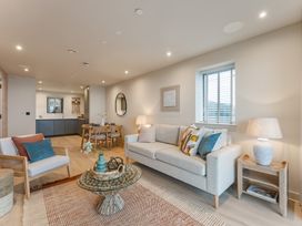 A living room with a sofa and coffee table at tbc in St. Ives