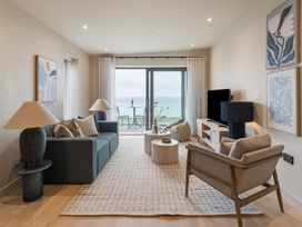 A living room with a sofa and a coffee table at tbc in St. Ives