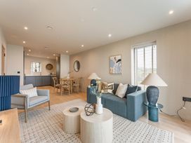 A living room with a sofa and coffee table at tbc in St. Ives