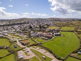 A view of houses and caravans in an outdoor area at tbc in St. Ives