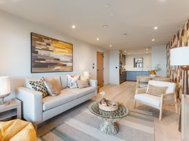 A living room with a sofa and coffee table at tbc in St. Ives