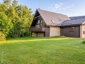 A house with a balcony and garden at The Derwent Spa (Pet) Slaley