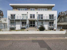 A building with balconies and windows at 7 Blue Water in Bournemouth
